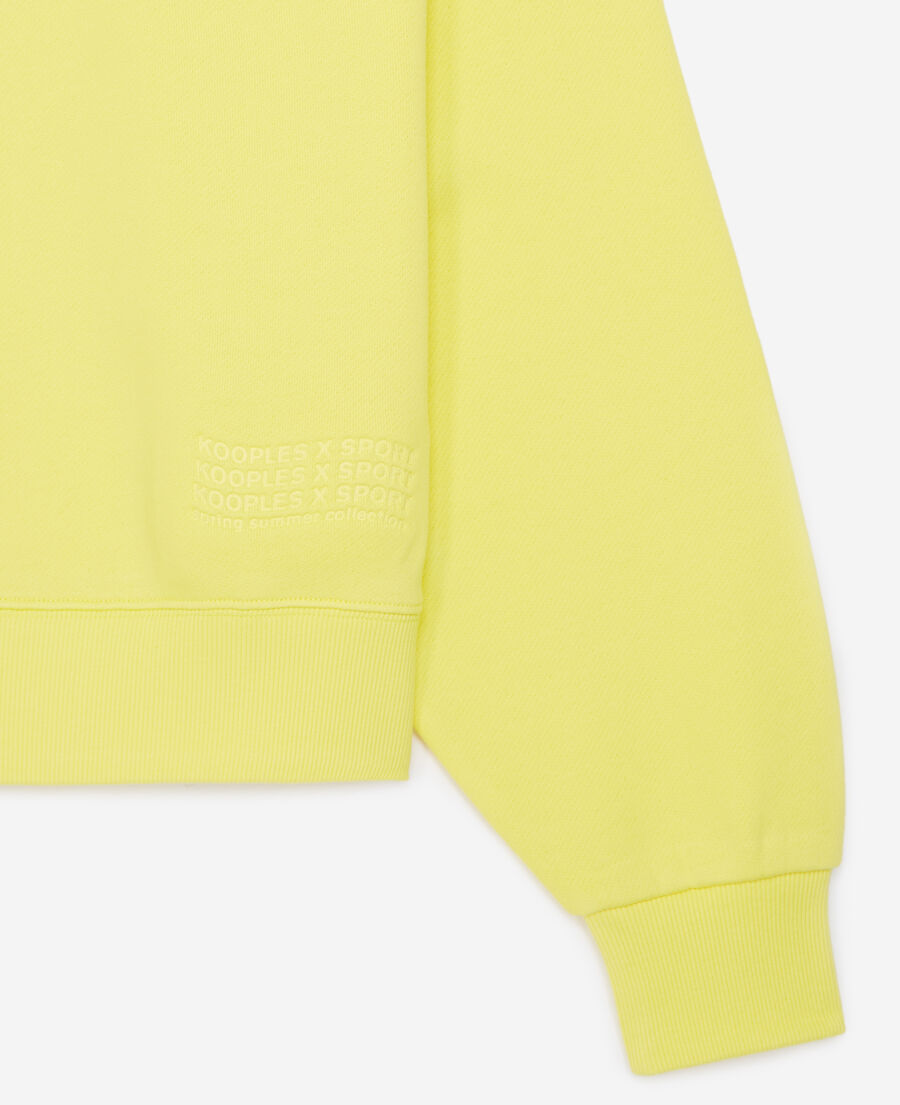 gelbes sweatshirt mit wellenlogoprägung