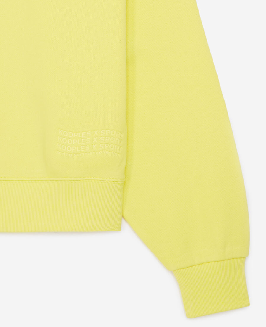 yellow sweatshirt with embossed logo