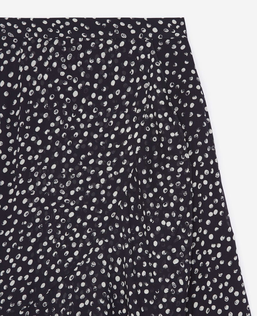 long flowing navy blue skirt with polka dots