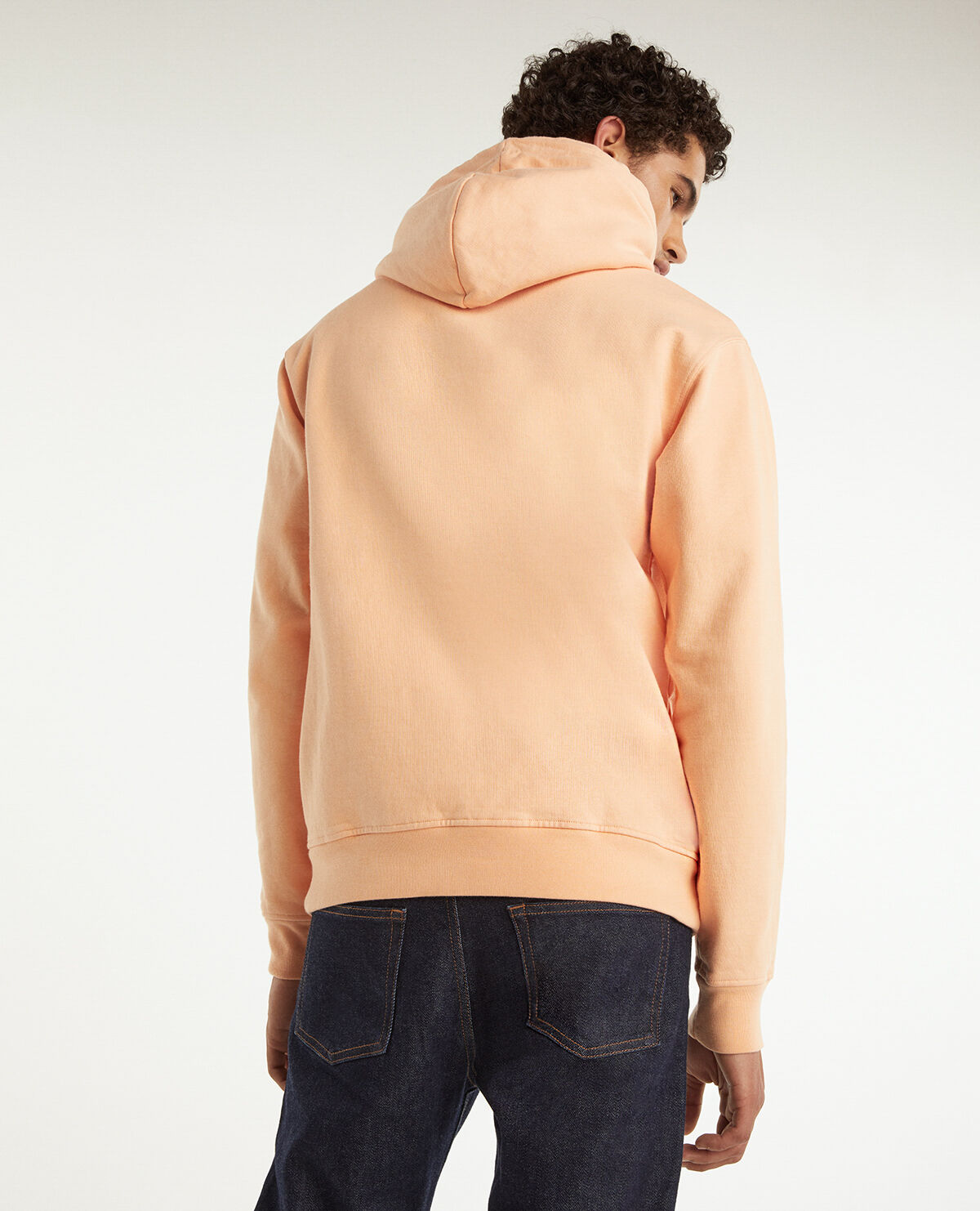 Coral hoodie with logo in middle