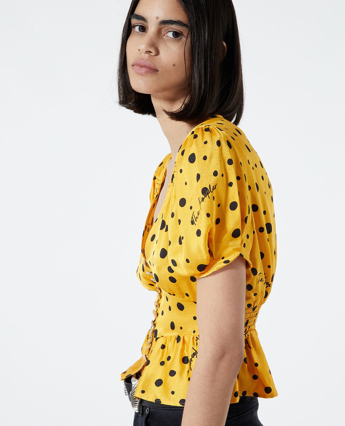 Yellow top with black polka dots hot sale