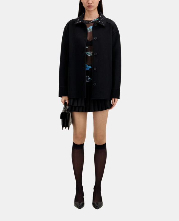 veste type surchemise noire avec étoiles