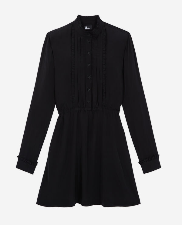 short black dress with low neckline