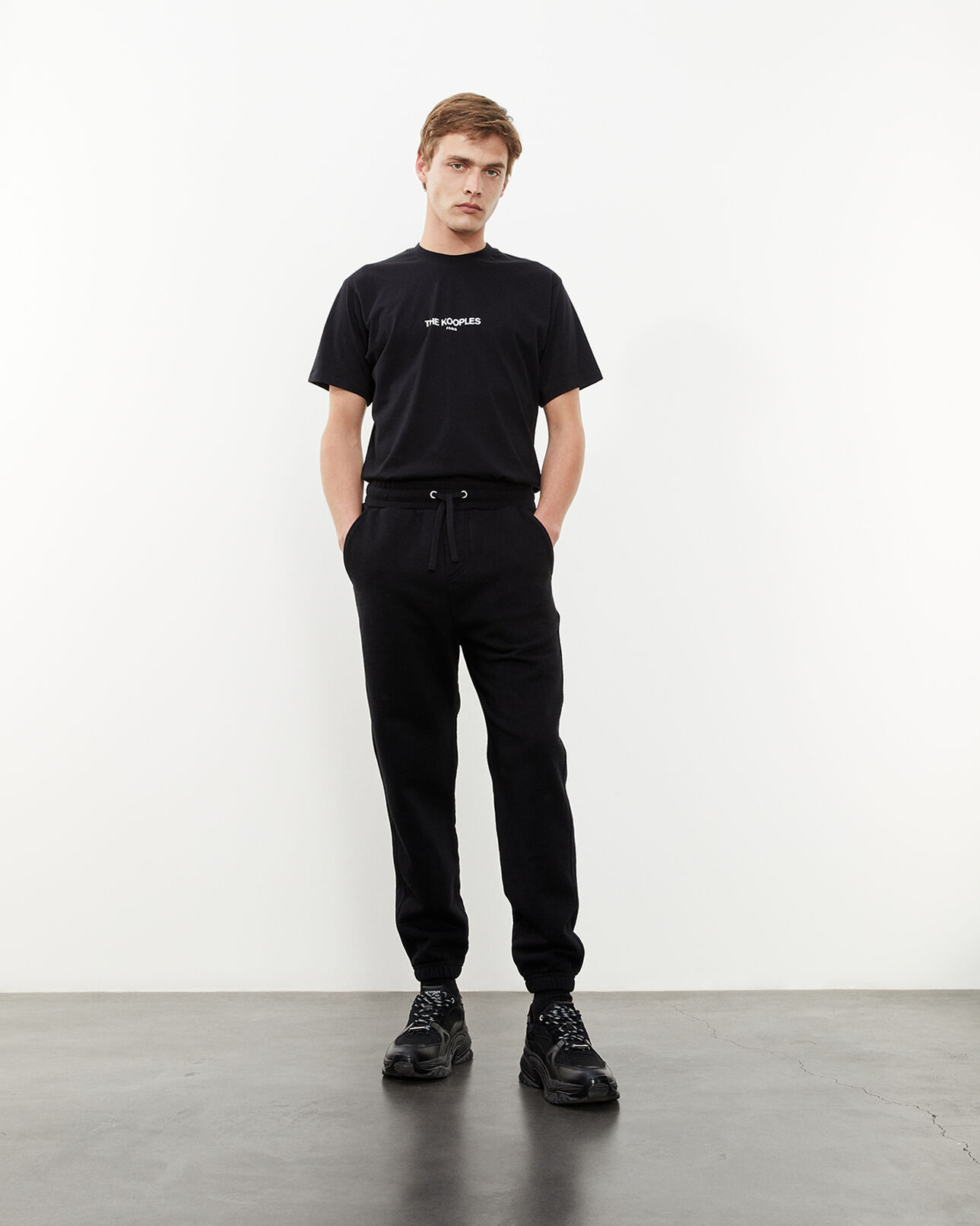 The Kooples HOMME BLACK jogging noir coton à logo contrastant