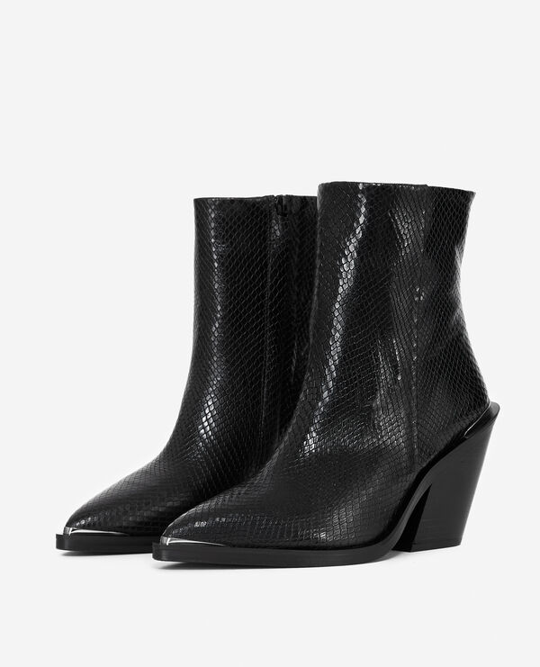 Heeled ankle boots in snake-effect leather