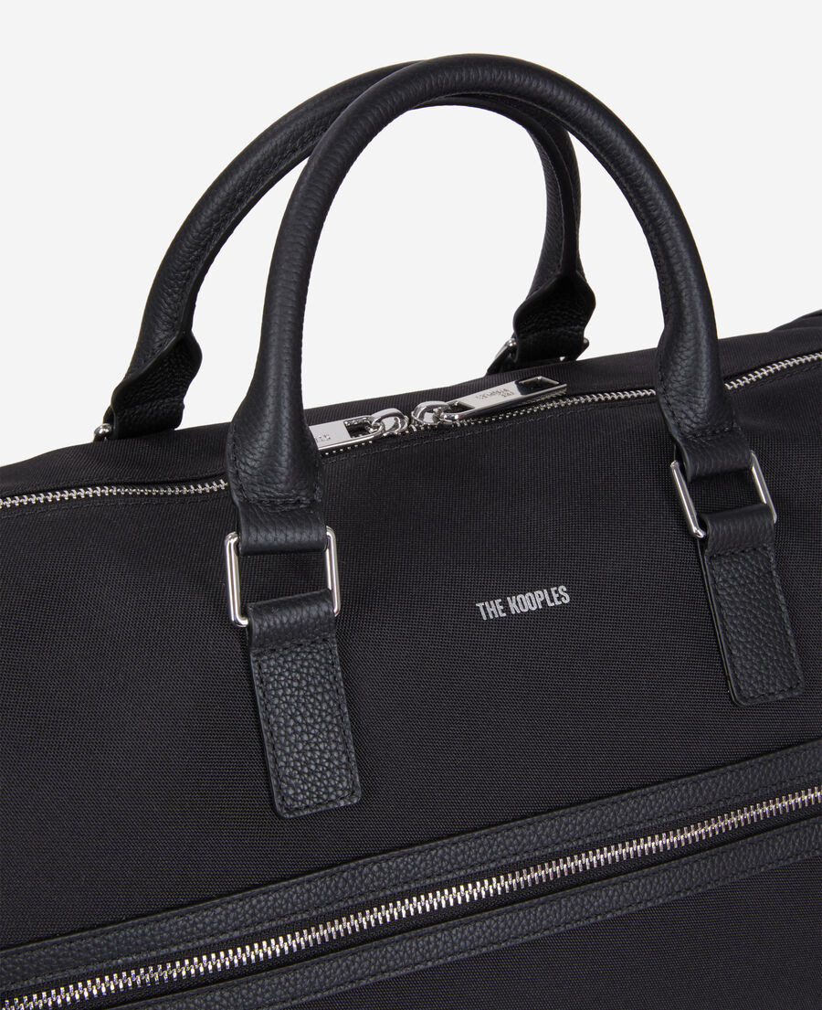 black leather and canvas weekend bag