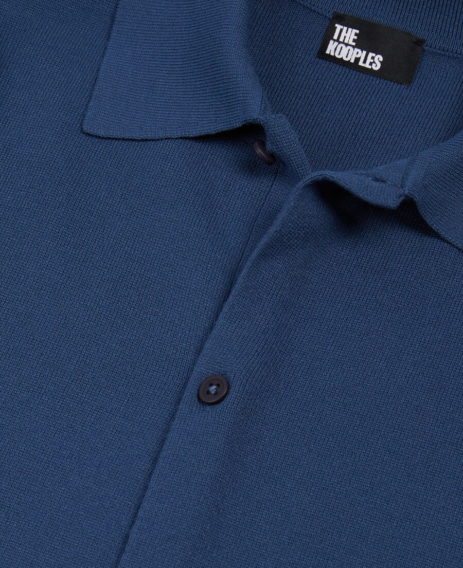 blue short-sleeved knitted shirt
