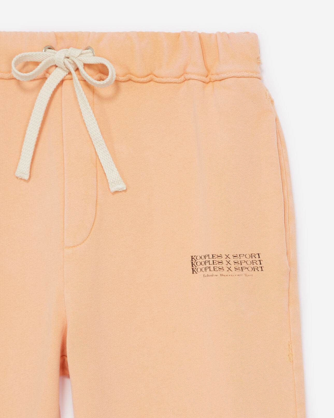 The Kooples WOMEN OLD ORANGE faded orange joggers with print