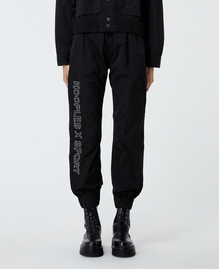 black trousers w/logo trims down sides