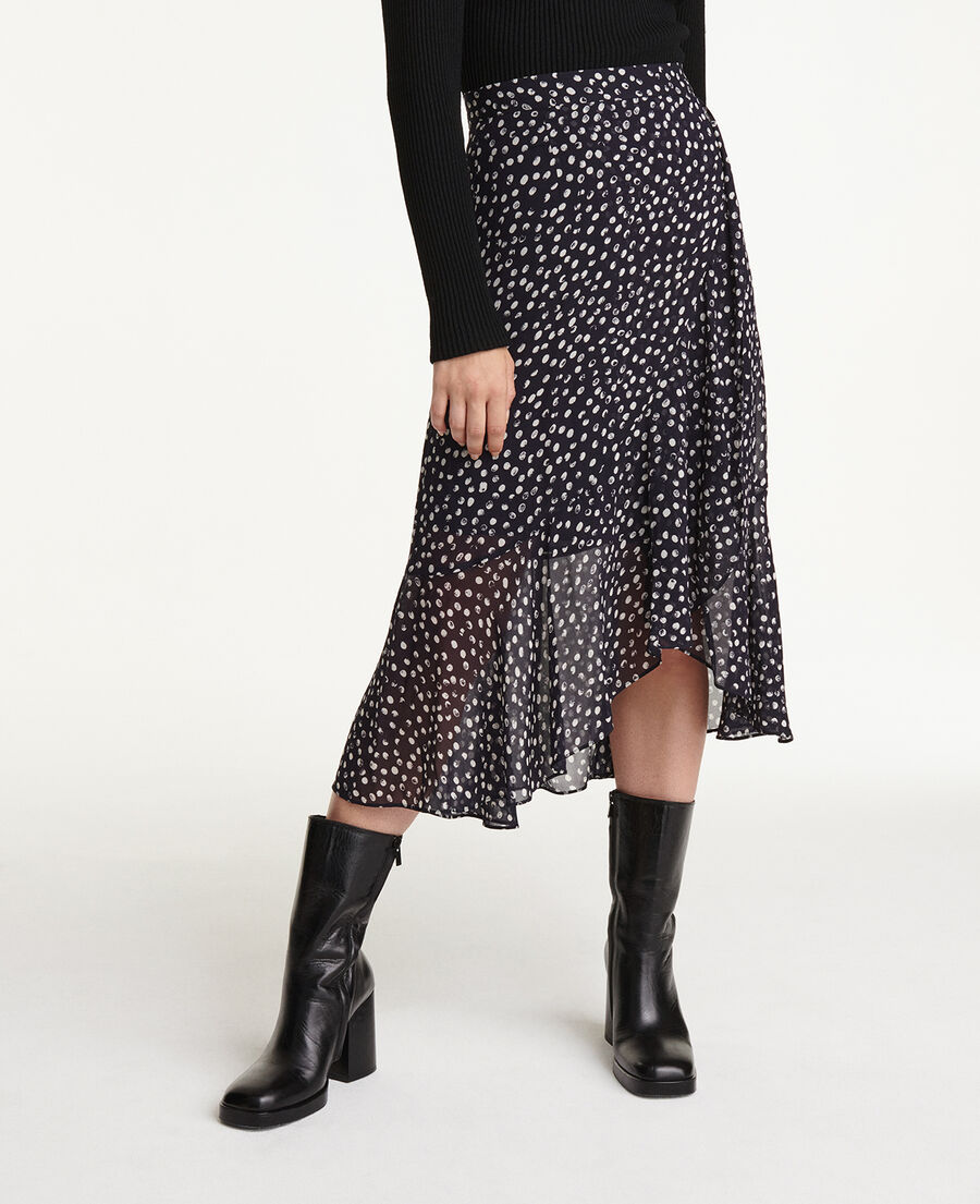 long flowing navy blue skirt with polka dots