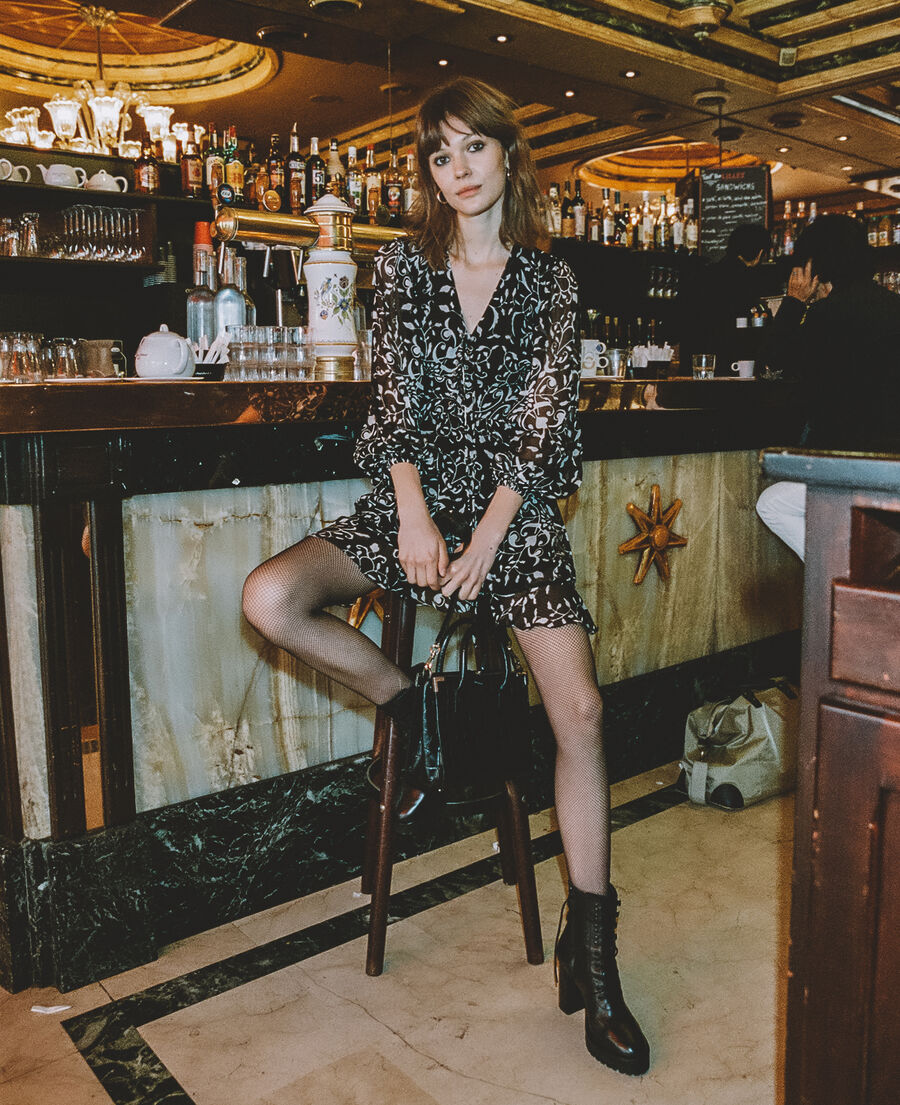 short formal dress with motif and lacing