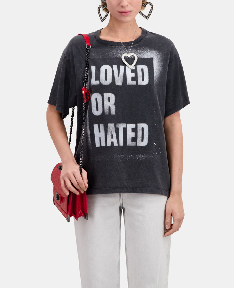 women's black t-shirt with loved or hated serigraphy