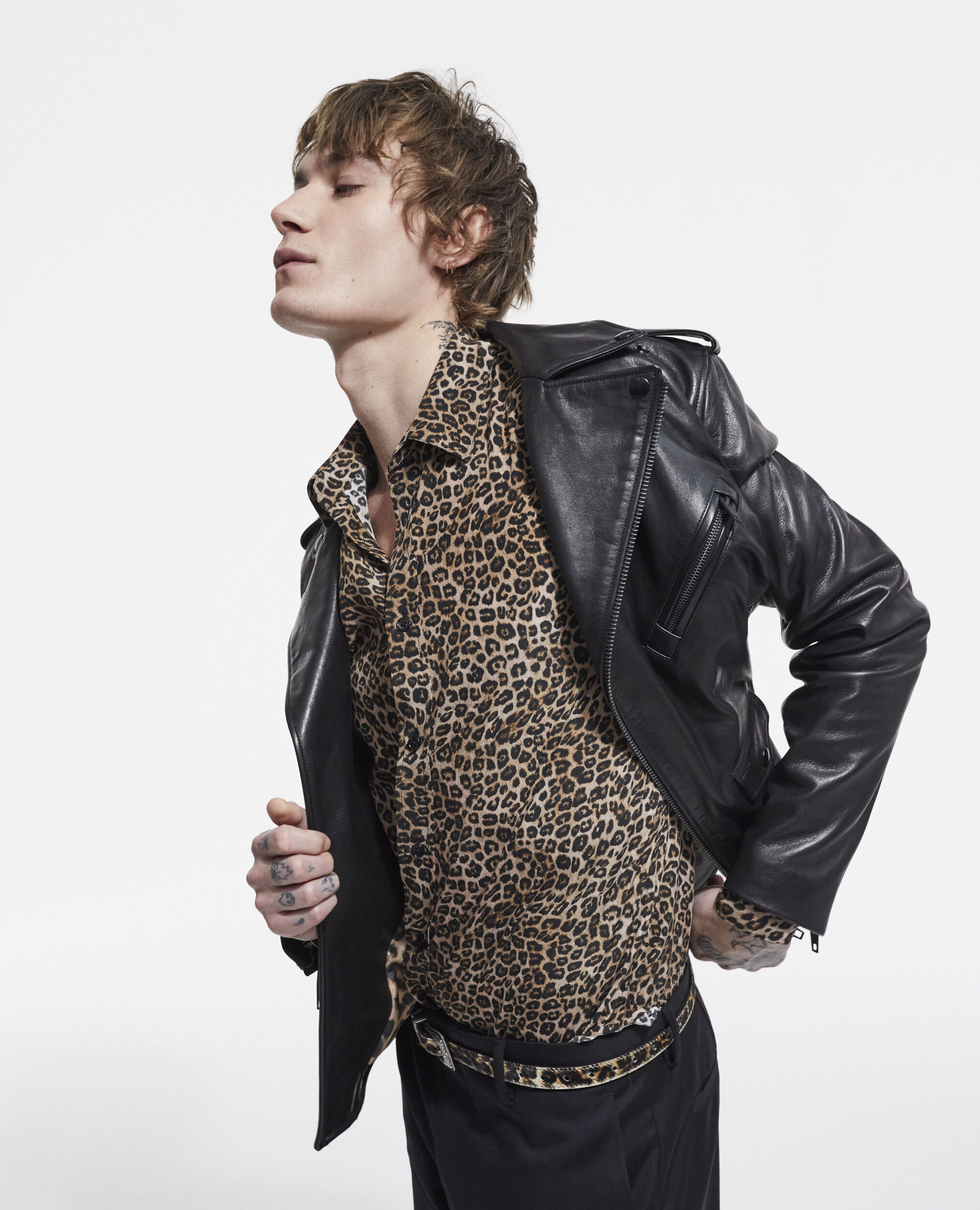 Leather jacket with leopard print lining