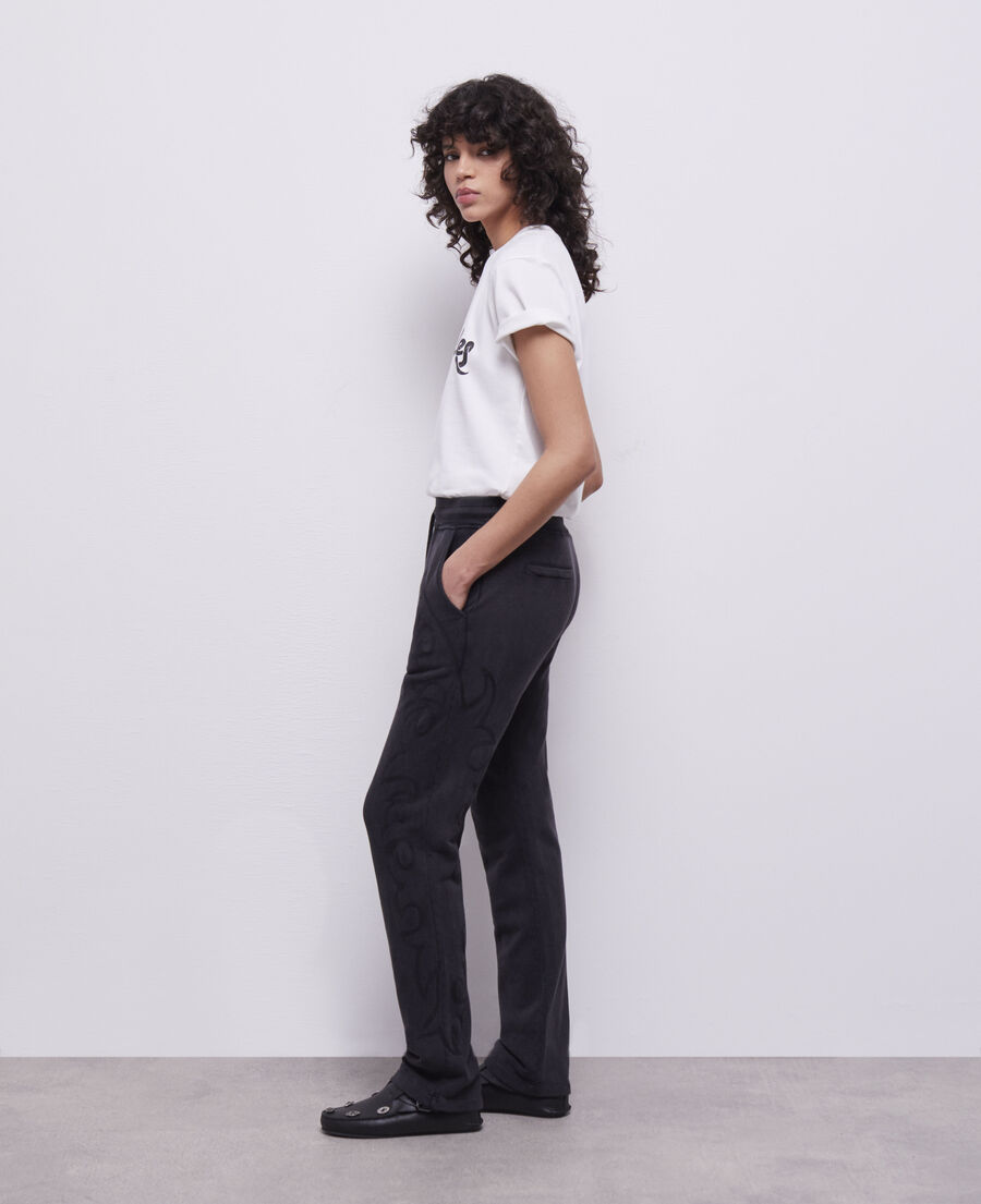 black joggers with western-style embroidery