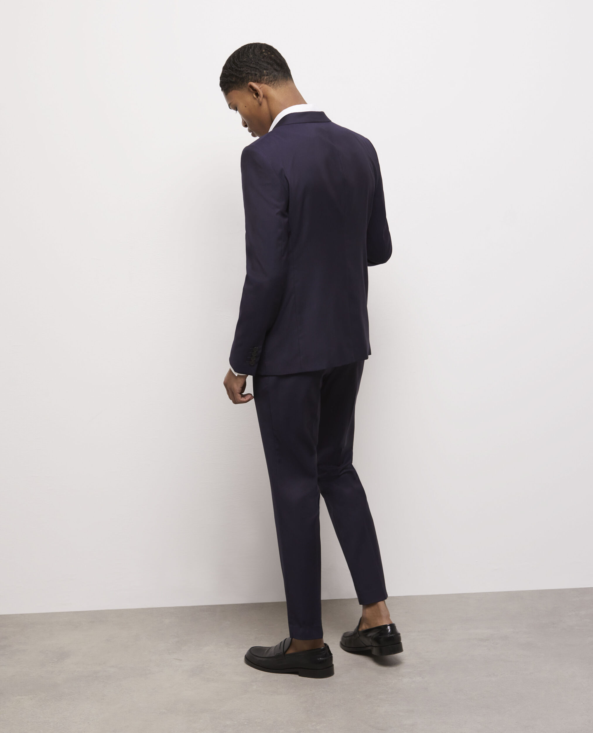 blue suit black trousers