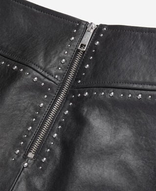 The Kooples WOMEN BLACK short black leather skirt with studs
