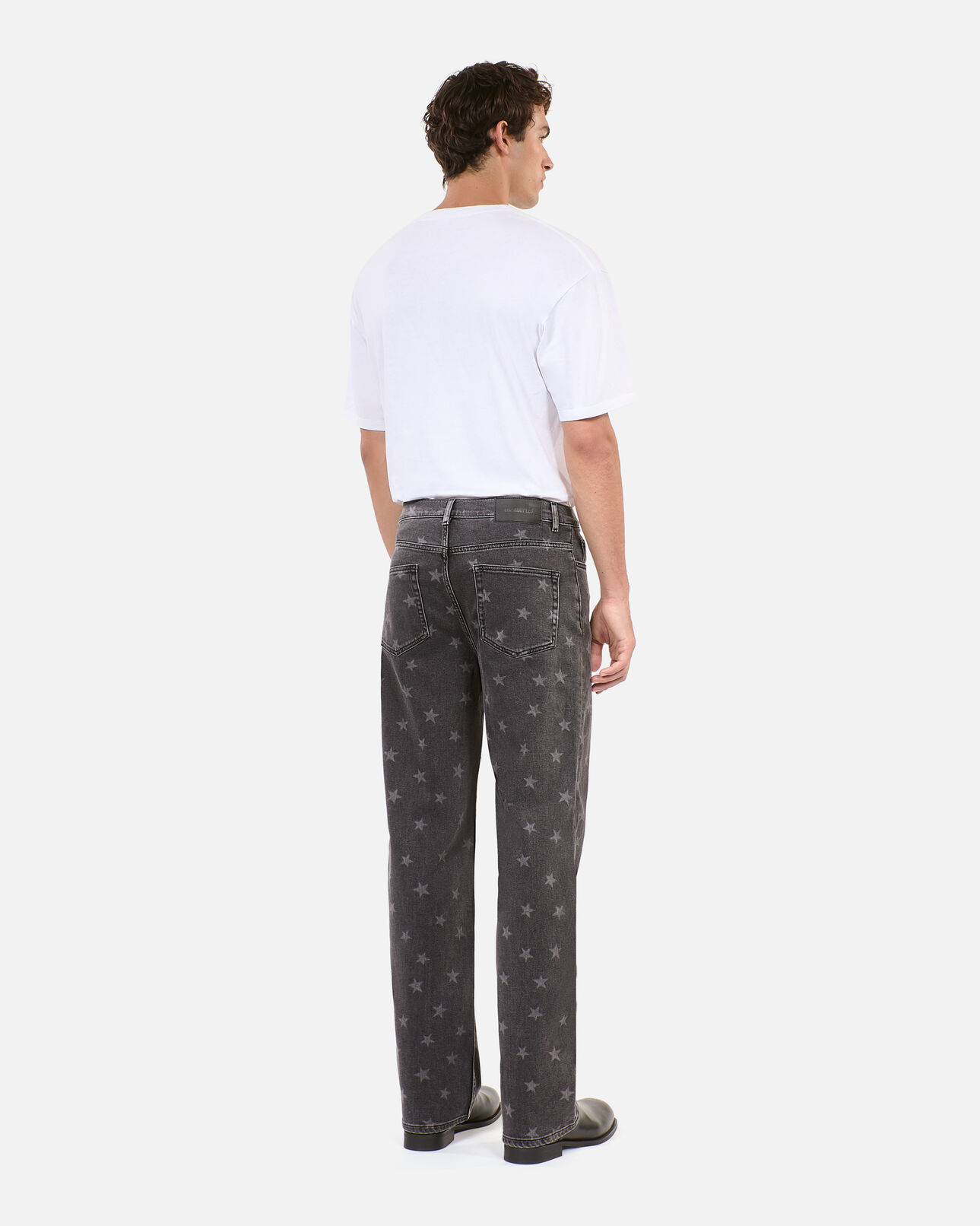 The Kooples HOMME BLACK WASHED jean droit imprimé étoiles