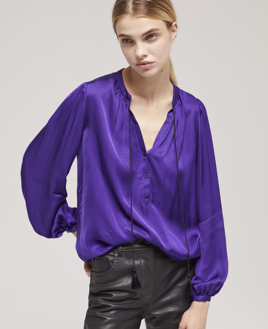 purple shirt with puffed sleeves
