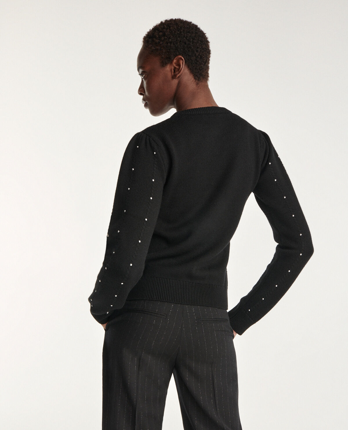 Black sweater with gathering stud detail The Kooples
