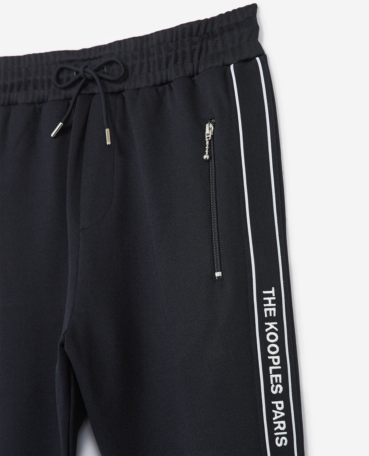 Skinny navy blue joggers with red band logo and zip