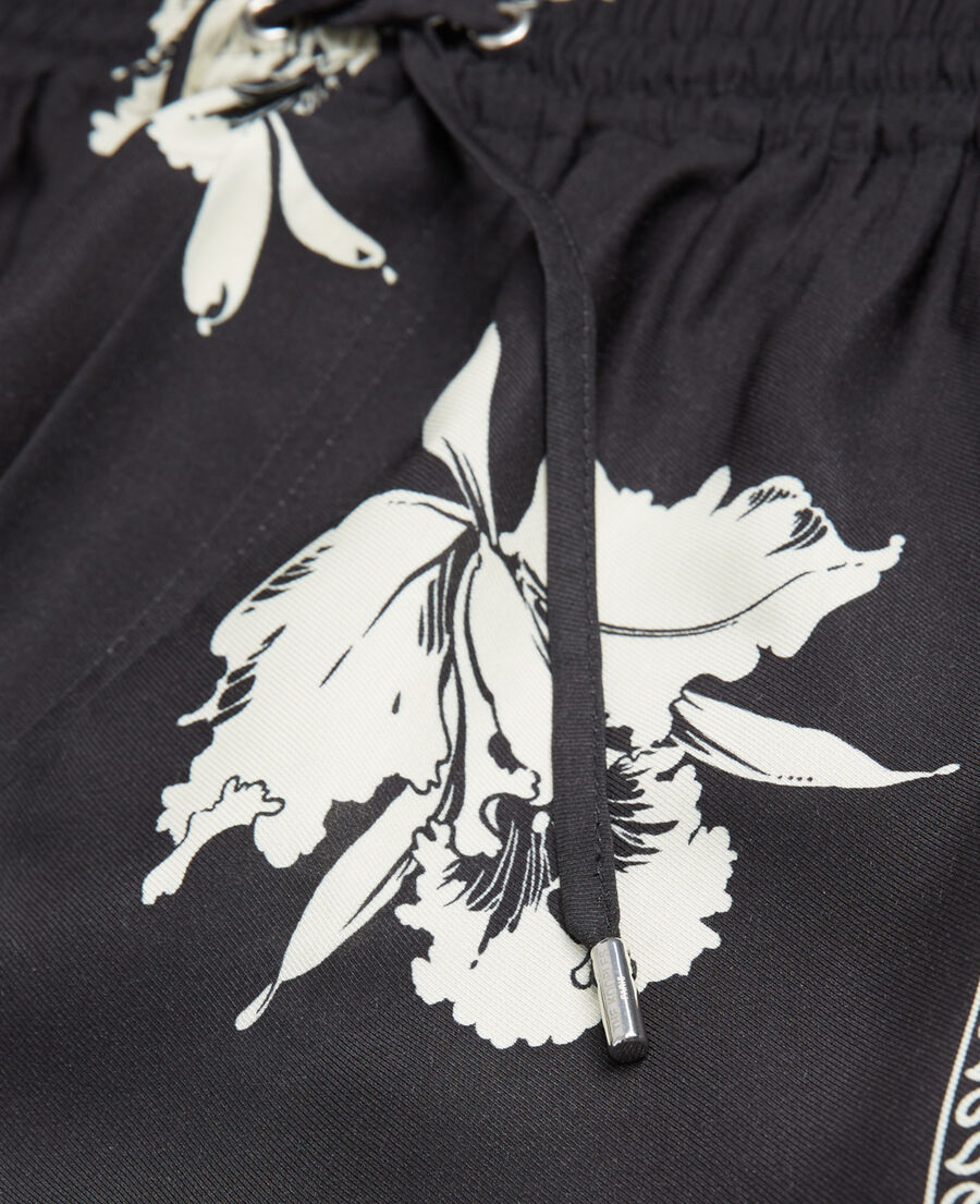 flowing black - white shorts w/ floral motif