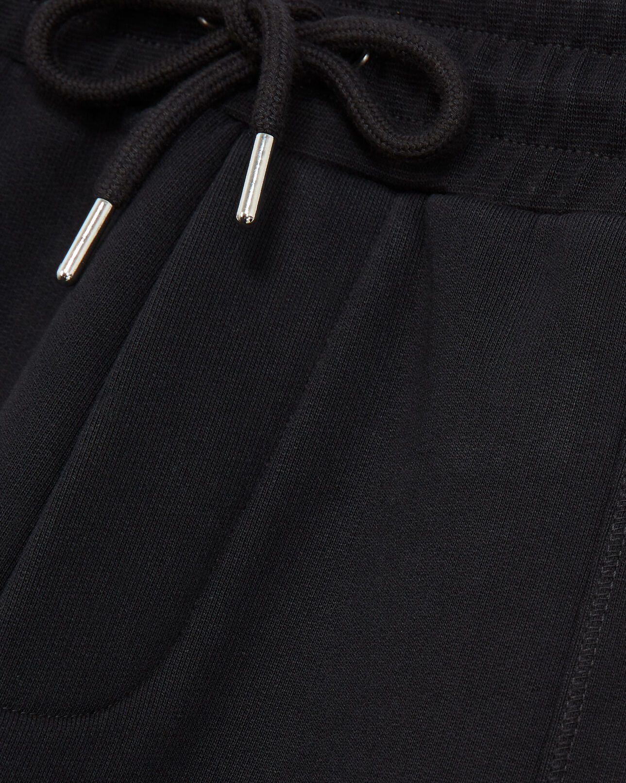The Kooples HOMME BLACK jogging noir imprimé the kooples latéral