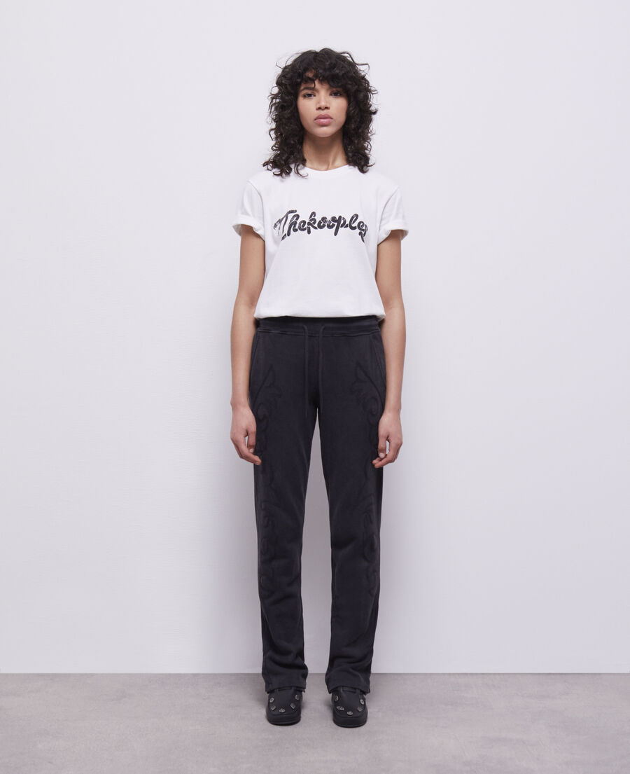 black joggers with western-style embroidery