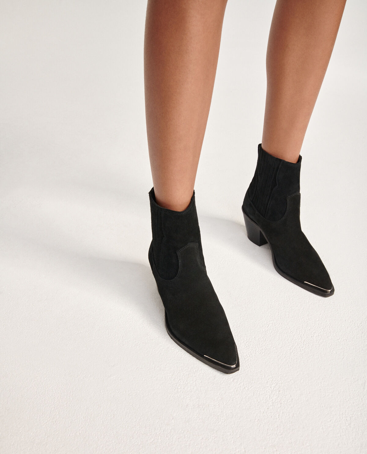 Western-style black suede ankle boots | The Kooples