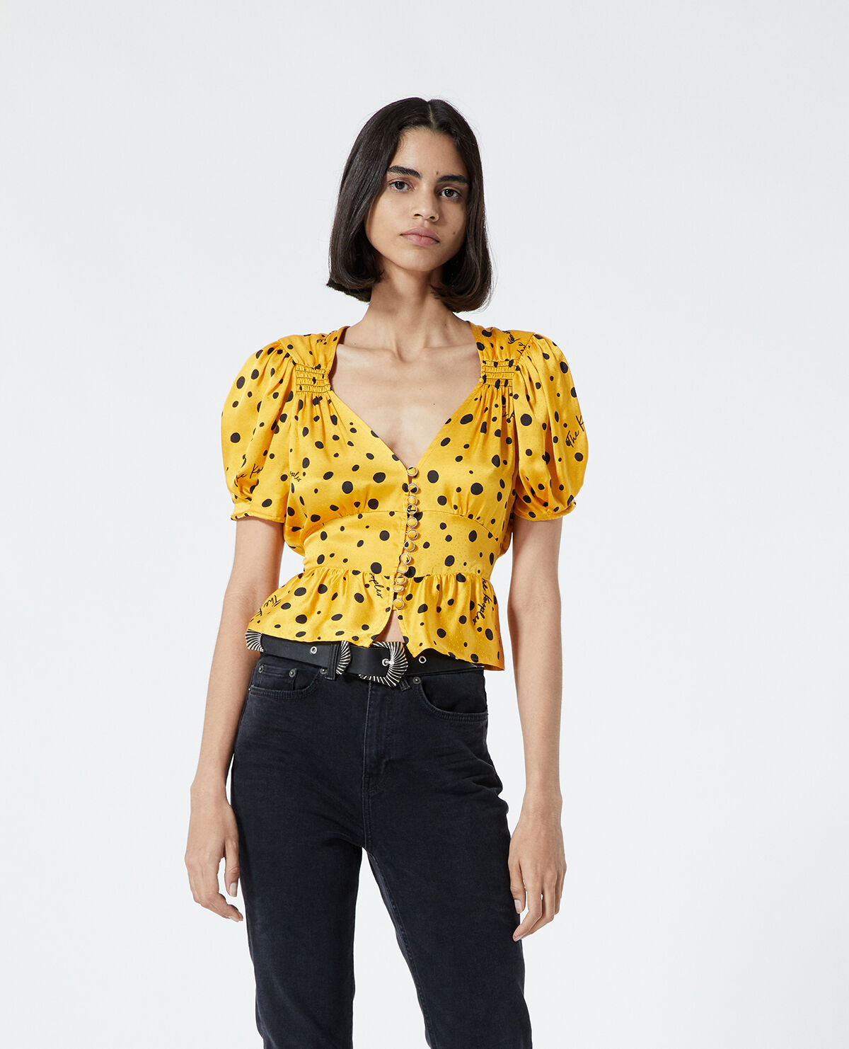 Yellow top with black polka dots on sale