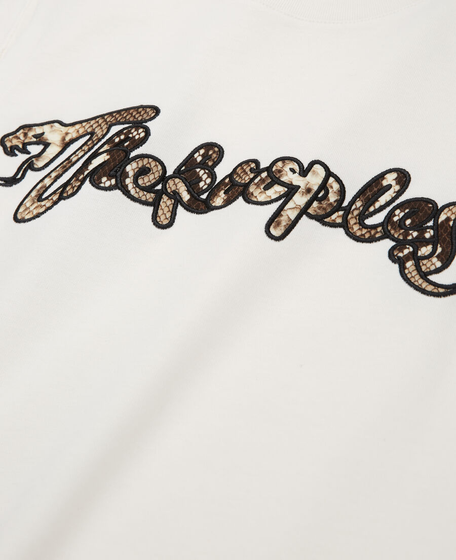 women's white t-shirt with snake logo print