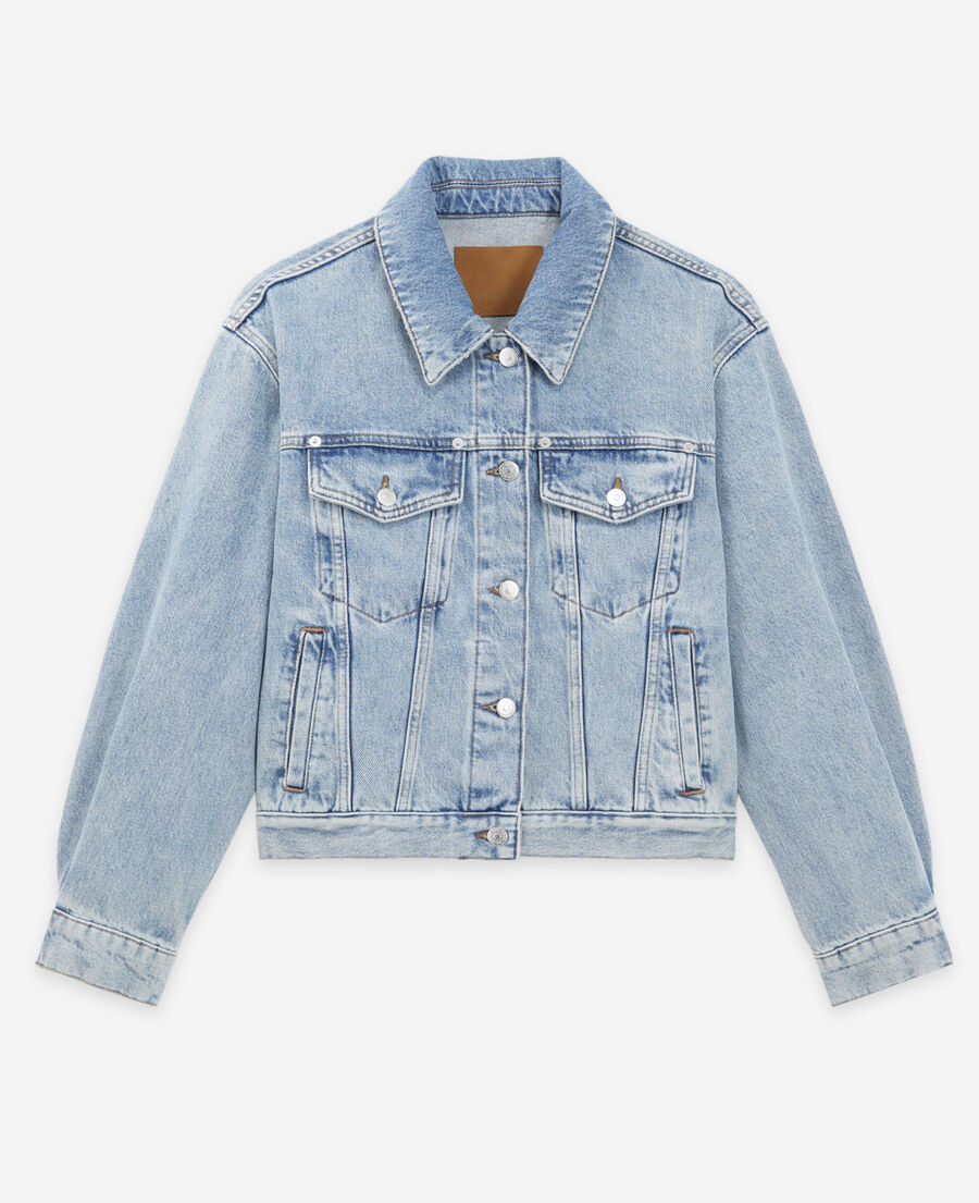 blue faded jean jacket with chest pockets