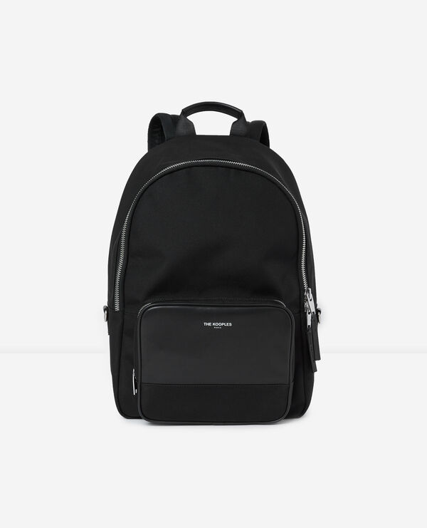 black backpack with imitation leather pocket