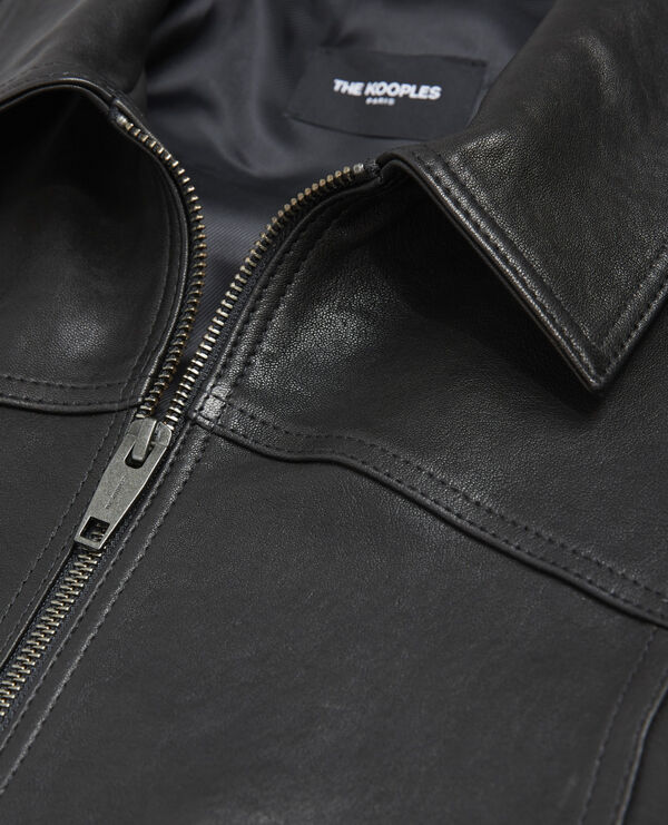 aged-effect leather jacket with ribbed edges