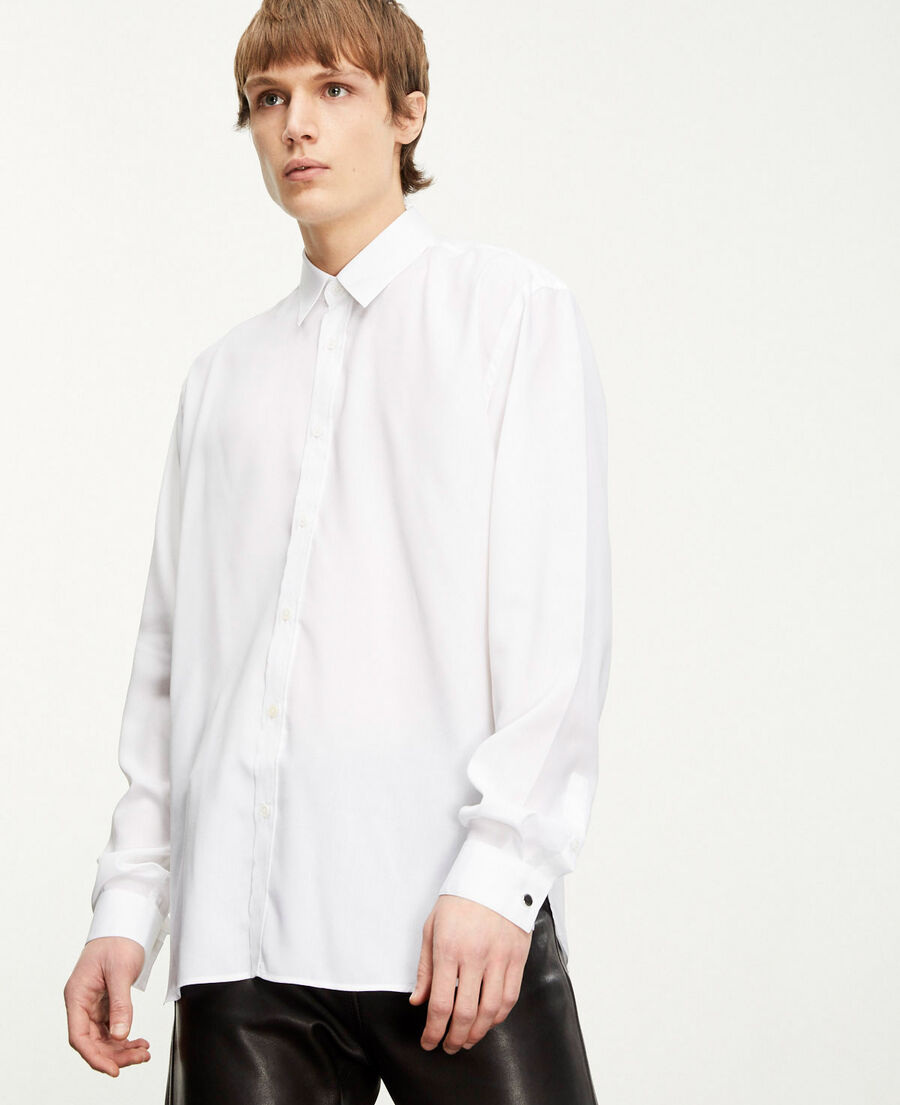 flowing white shirt with long sleeves