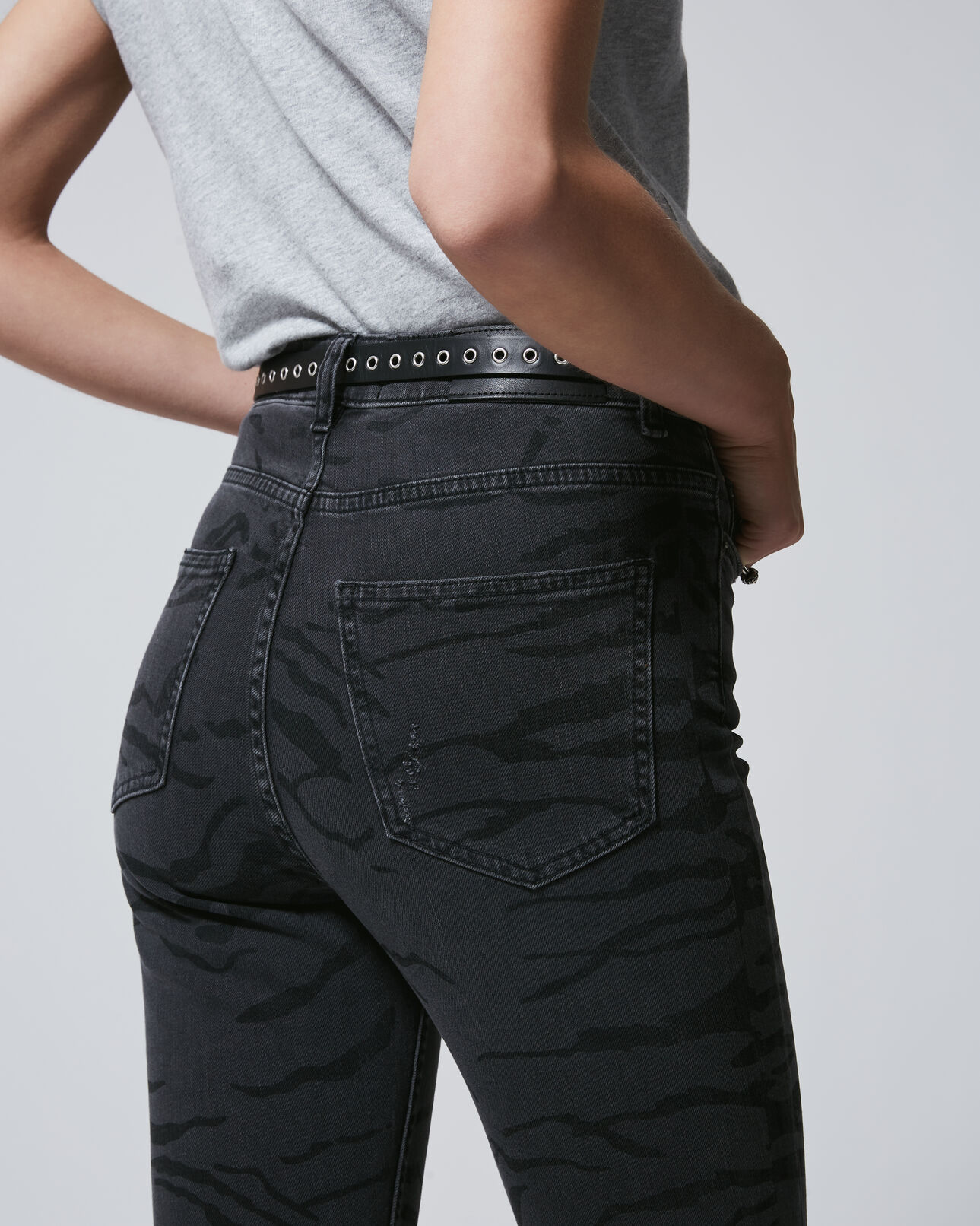 The Kooples WOMEN BLACK high-waist faded black jeans with zebra print