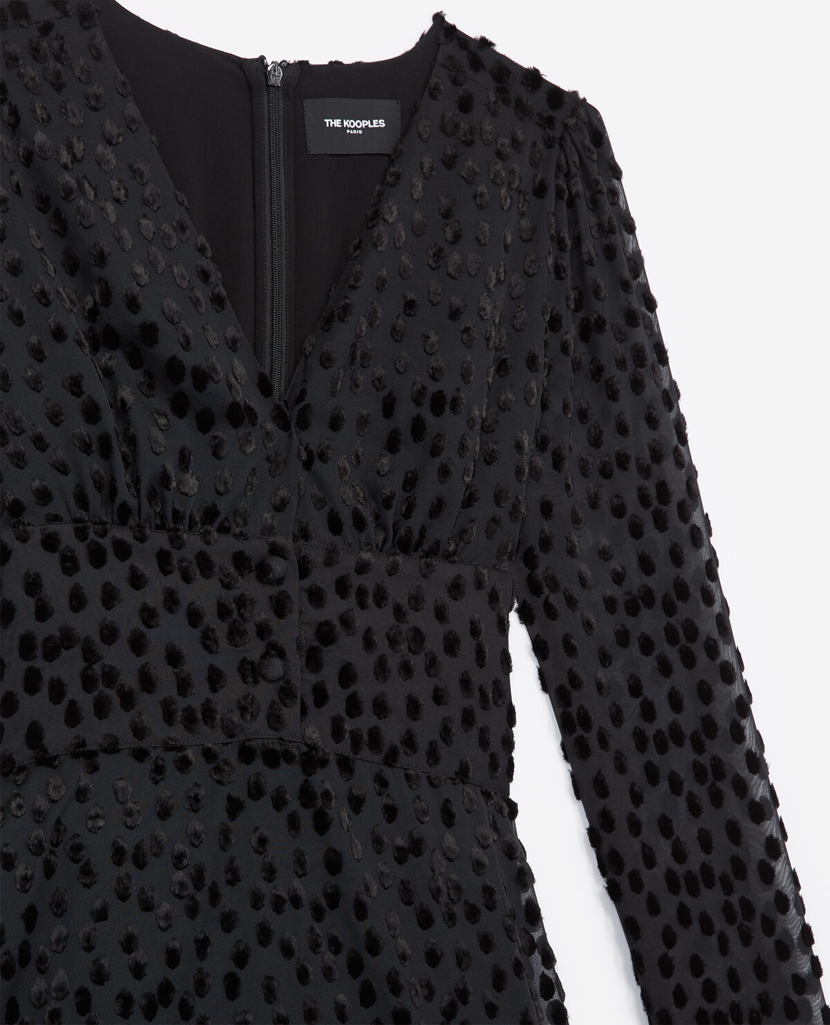 Short black polka dot dress with marked waist The Kooples