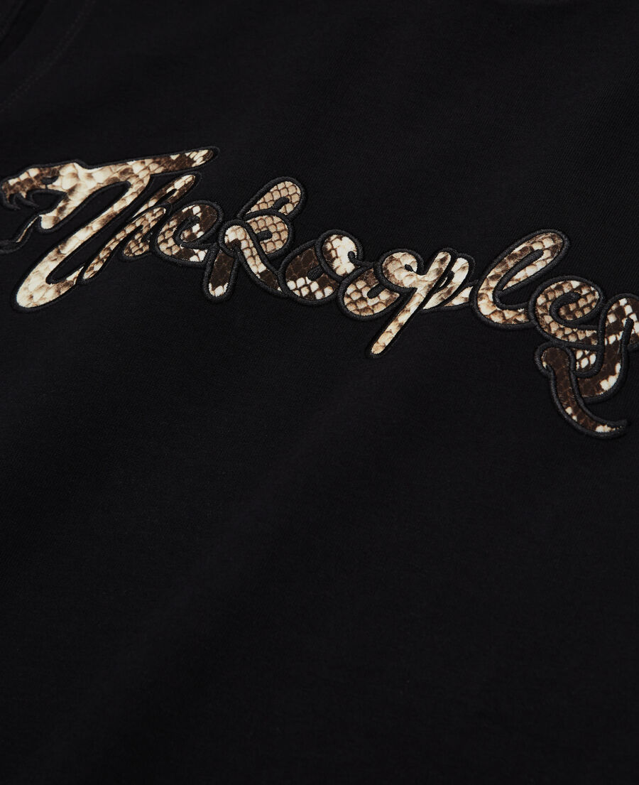 women's black t-shirt with snake logo print