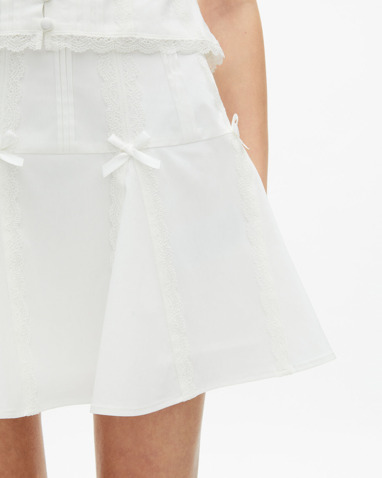 The Kooples WOMEN ECRU short skirt with bow detail in ecru