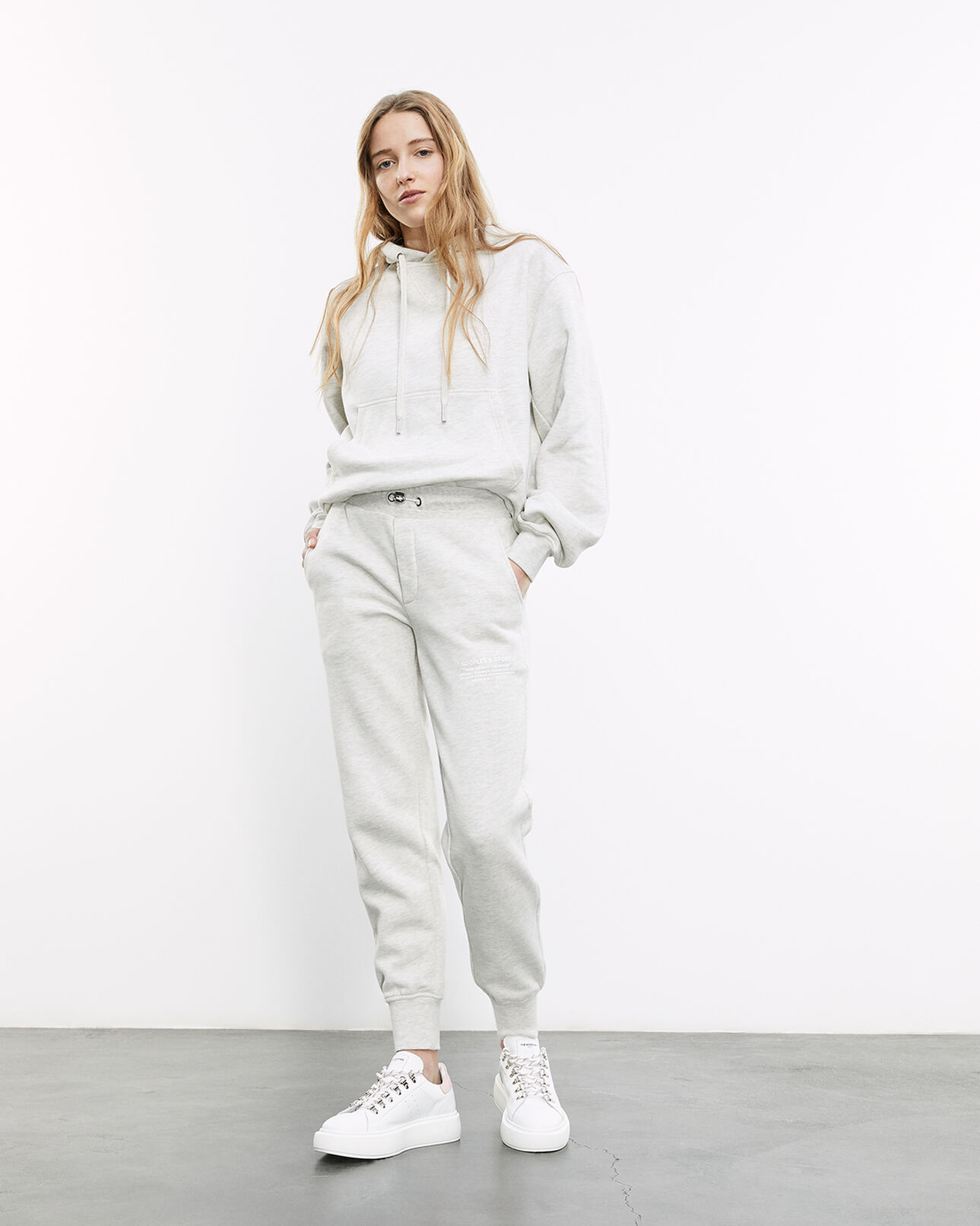 The Kooples WOMEN LIGHT GREY MELANGE gray joggers with rubber logo