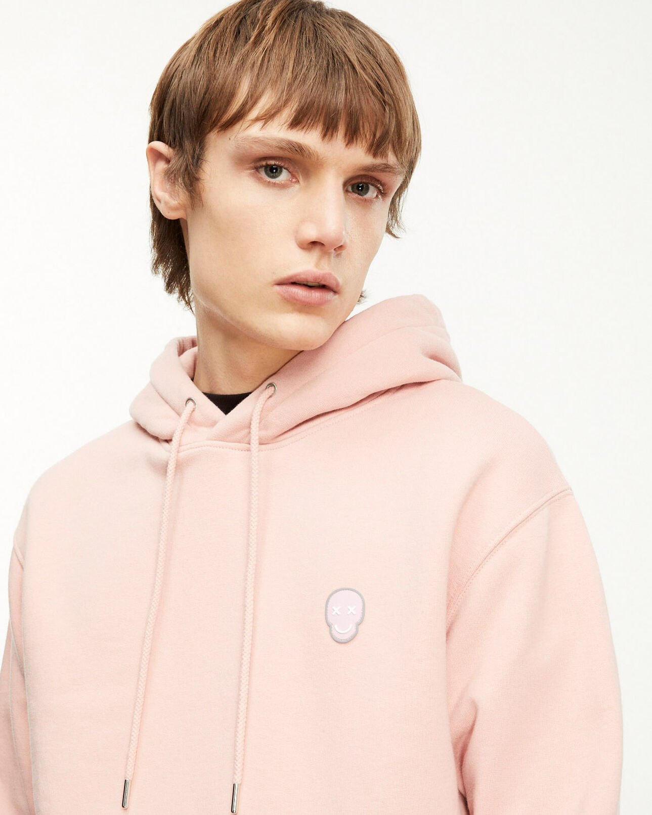 The Kooples HOMME PINK sweat rose pâle à capuche et badge