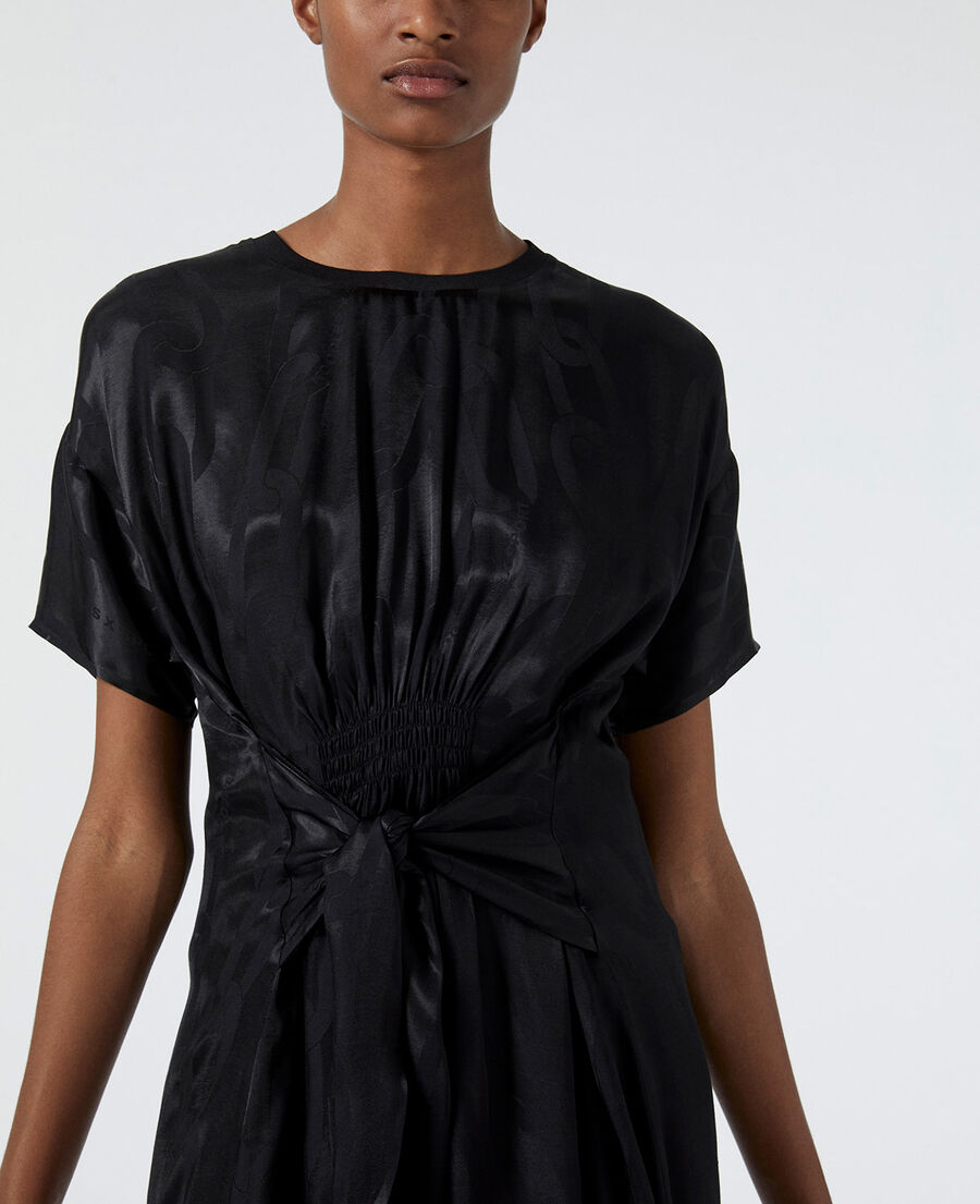 black dress with tone-on-tone chain motif