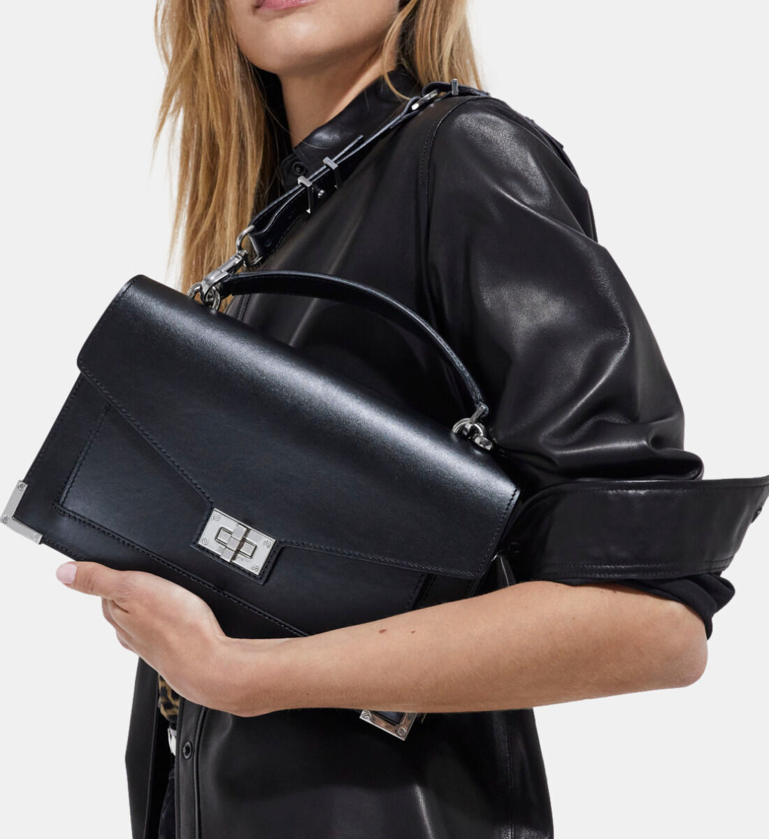 Black glazed leather Joe baguette bag with Western buckle | The Kooples - US