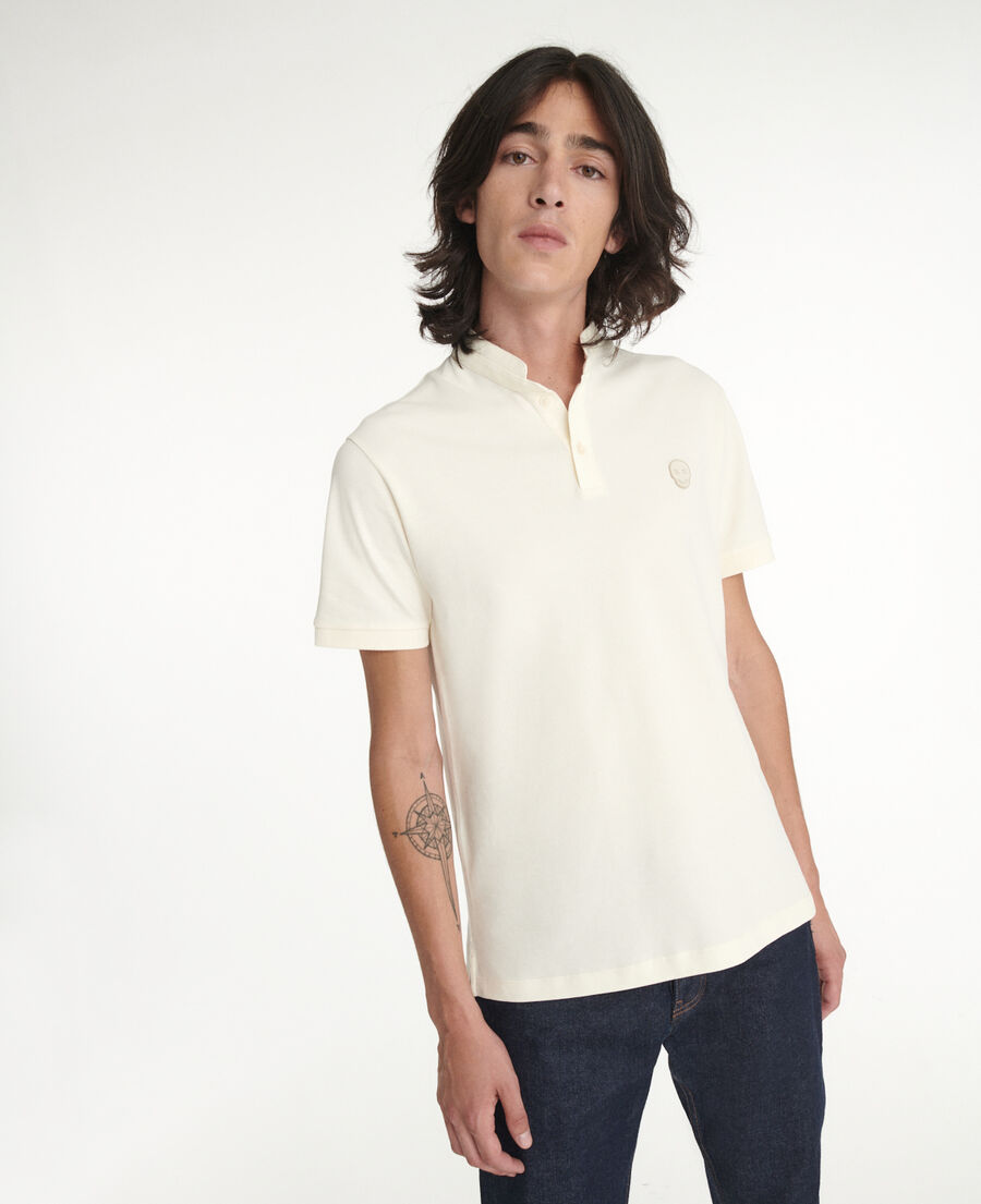 cream officer-collar polo with breast badge
