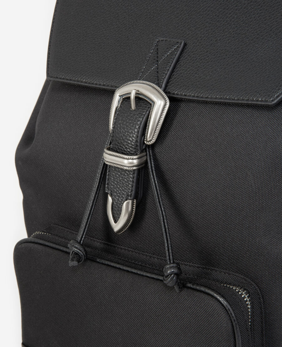 black backpack with western buckle
