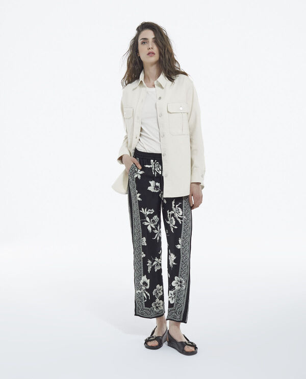 flowing black - white pants with scarf motif