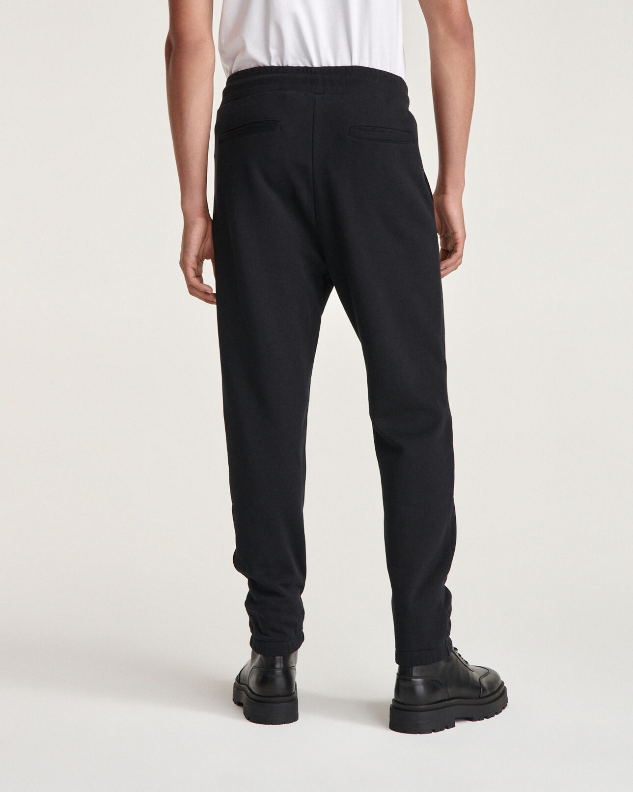 The Kooples HOMBRE BLACK chándal negro con estampado what is