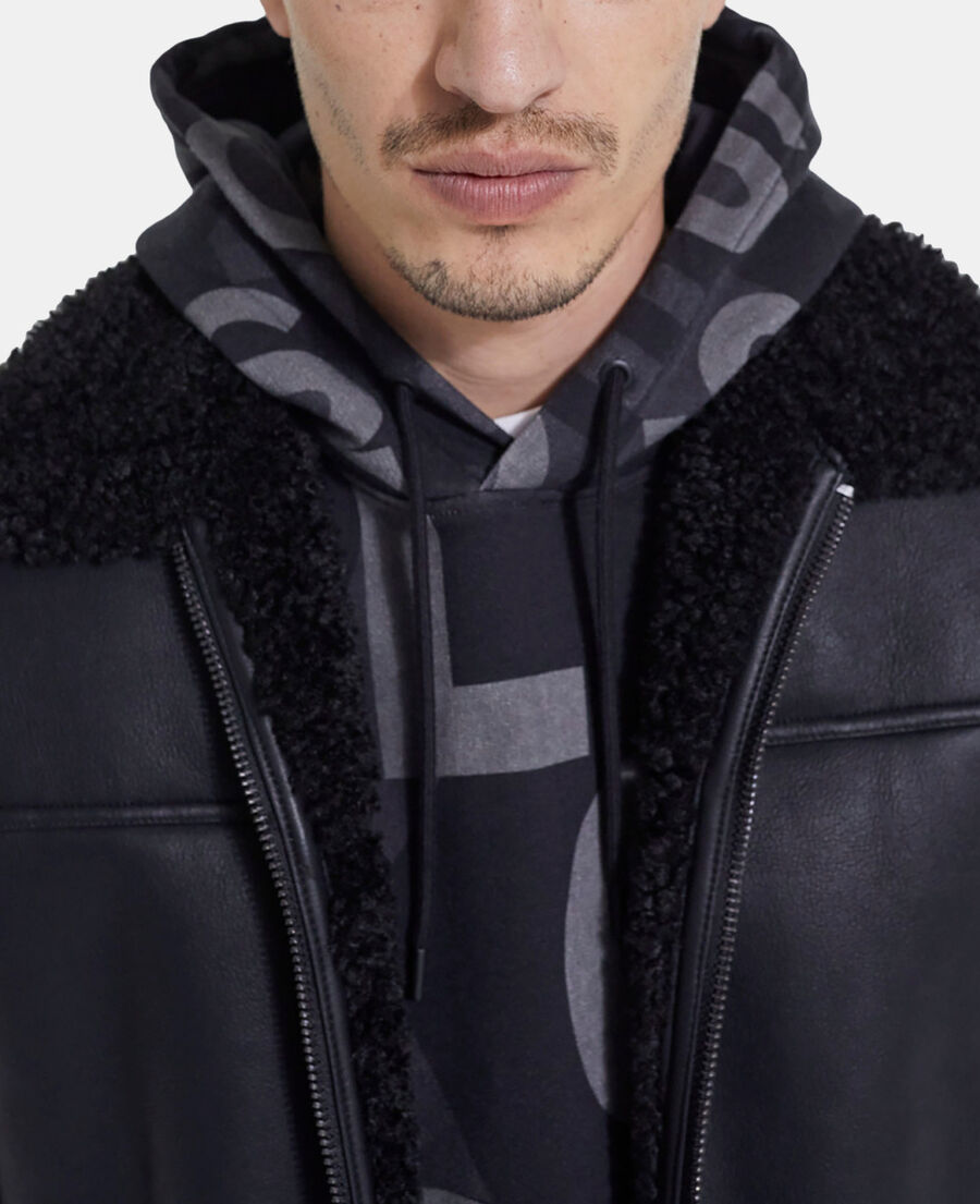 black faux fur coat