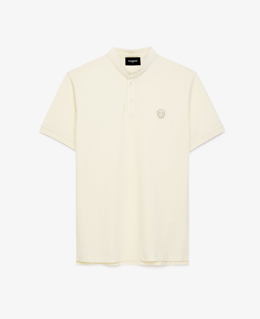 cream officer-collar polo with breast badge