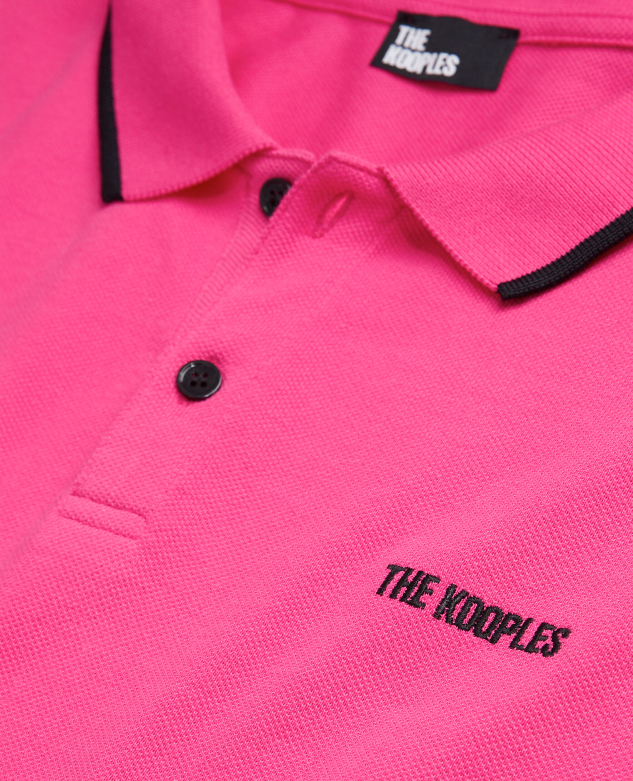 The pink polo shirt with logo an iconic piece from The Kooples Buy one of these new models now on our website