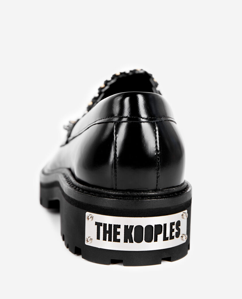 The Kooples WOMEN BLACK penny loafers in black leather with fringes and studs